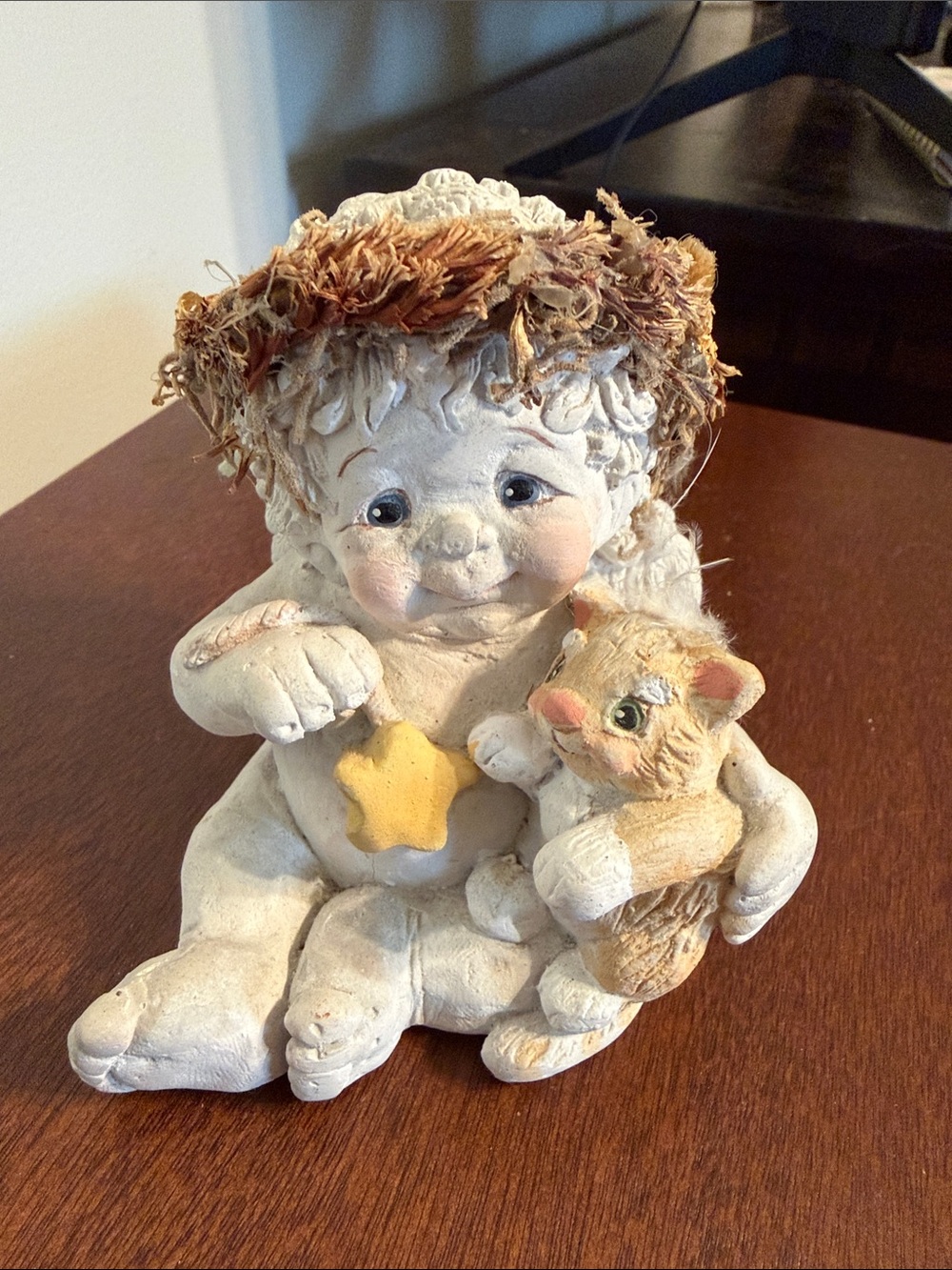 Dreamsicles White Ceramic Cherub Sculpture with Tan Hat and Yellow Star